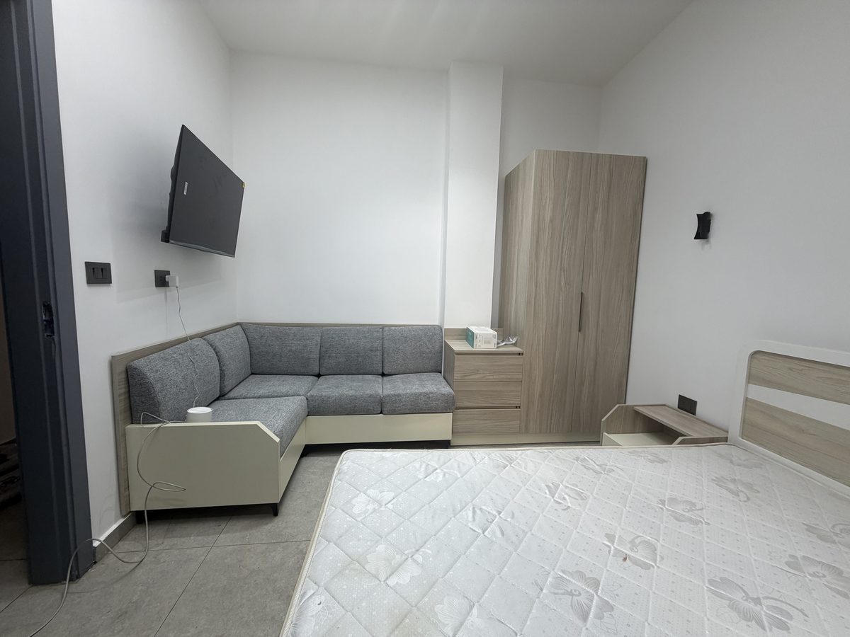 Studio 104 living area with TV